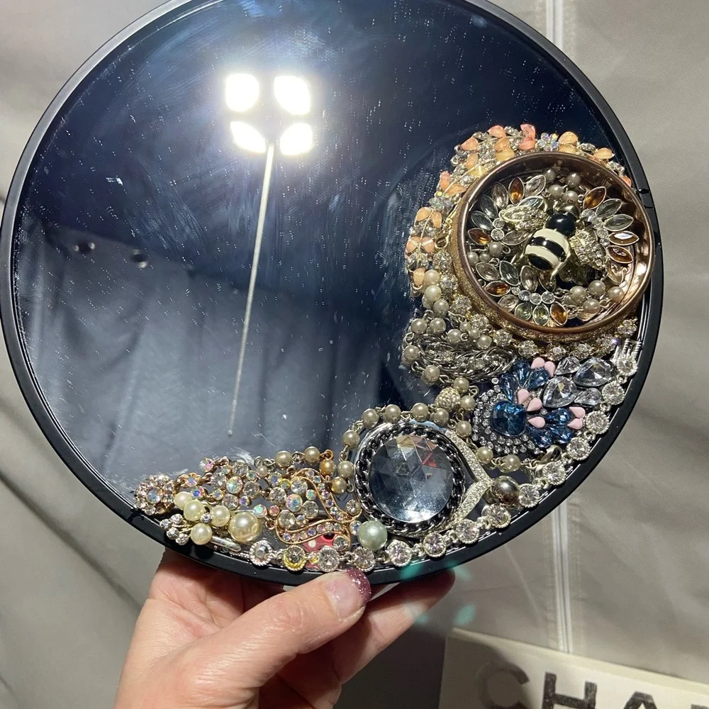 Hand Jeweled Mirror. Measurers Approximately 10 inches.